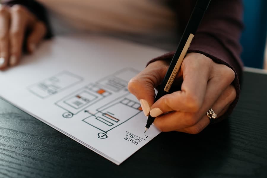 A designer sketching on a tablet